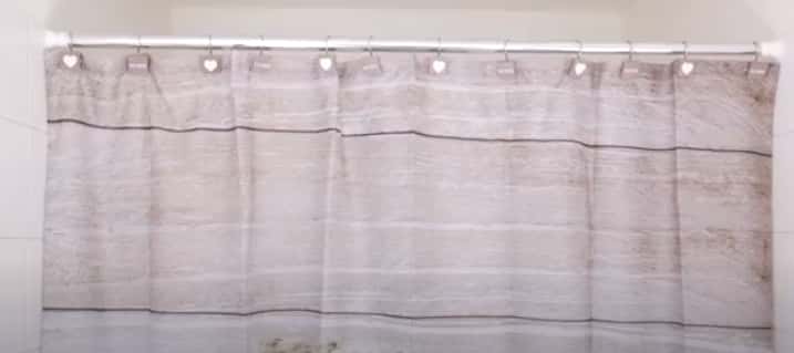 Installing ceramic shower curtain rod